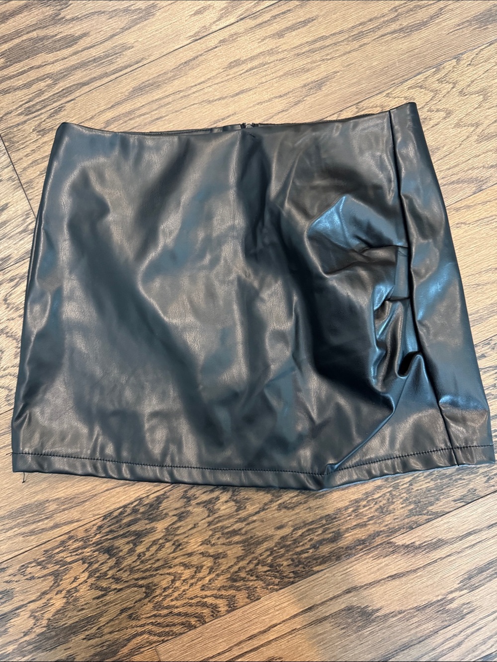 Black Faux Leather Mini Skirt NEW WITH TAGS. •